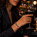 Lotus bracelet with amethyst and green gemstones adding refined crystal jewelry style for evening wear