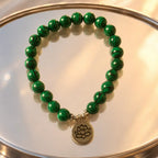 Lotus charm tigereye elegant green gemstone bracelet with lotus pendant for peaceful energy and style
