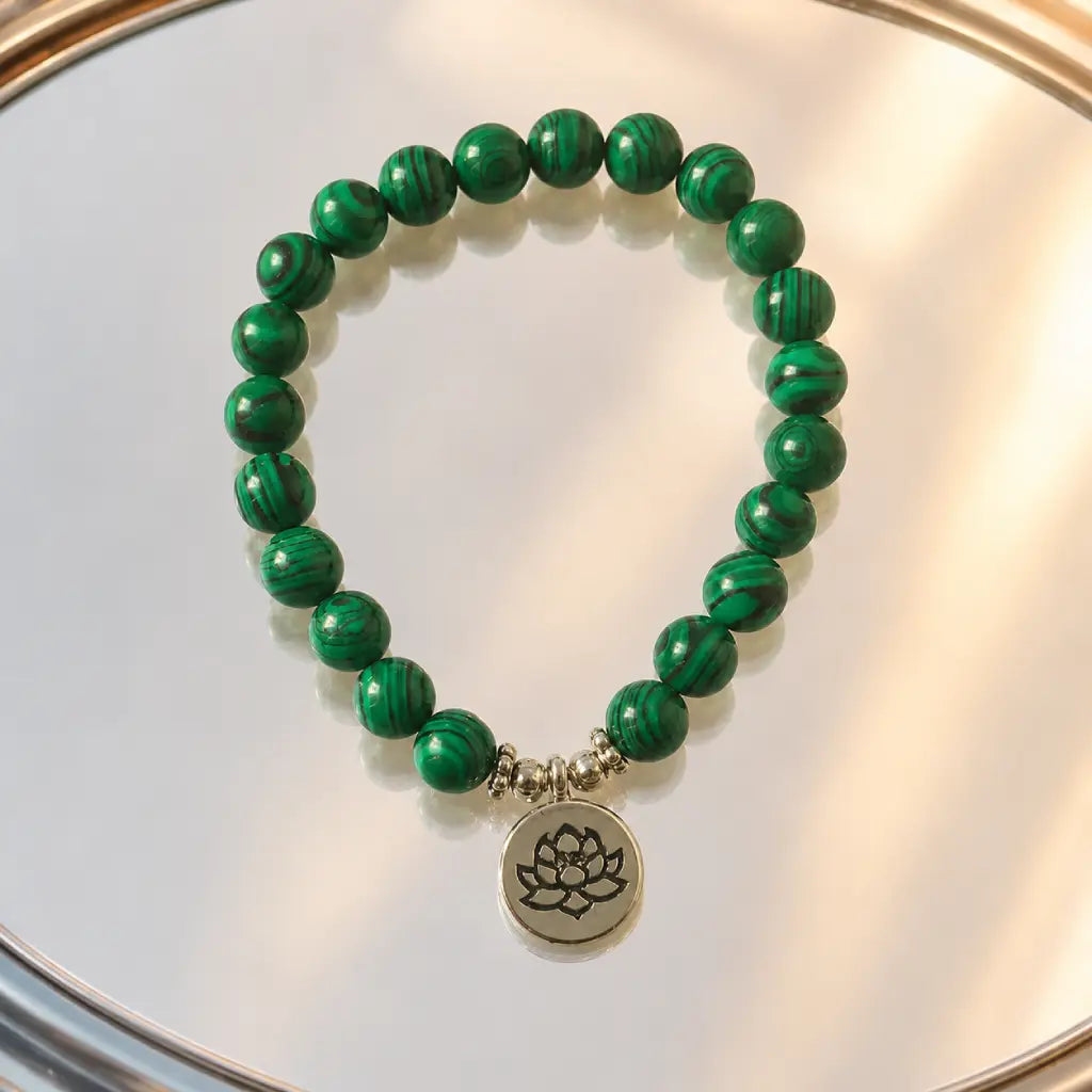 Lotus charm tigereye premium gemstone bracelet with polished green beads for yoga and meditation style