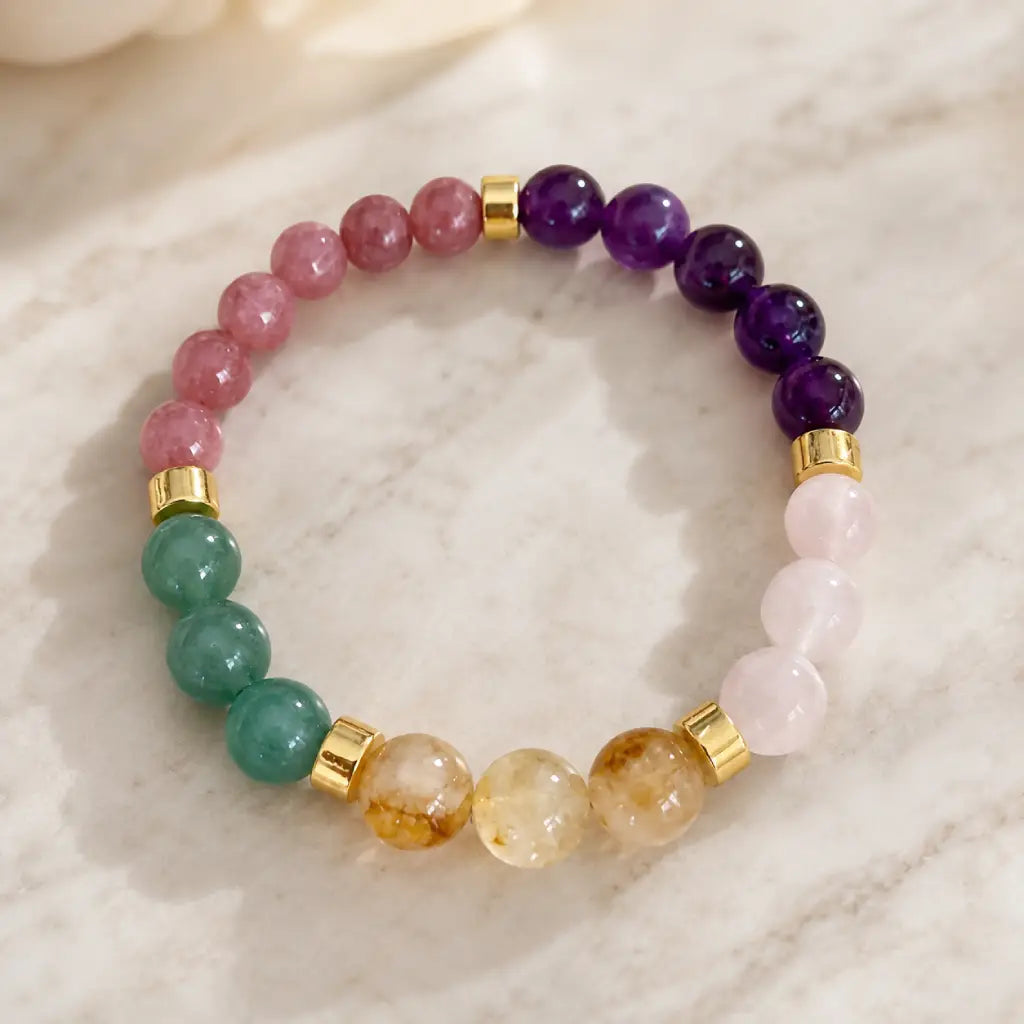 Manifestation bracelet with multicolor gemstone beads and crystal healing energy for mindful daily balance.