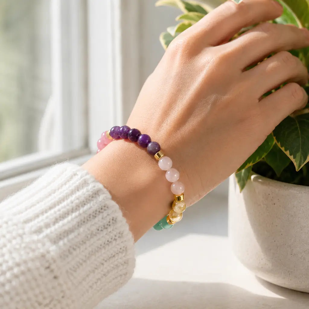 Manifestation bracelet worn near natural light with crystal healing stones supporting positive intentions.