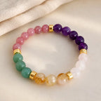 Manifestation bracelet crafted with healing crystal beads and gemstone energy for uplifting wellness rituals.