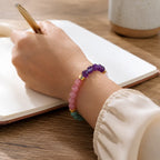 Manifestation bracelet styled during self-care rituals with healing crystals promoting balance and wellness.