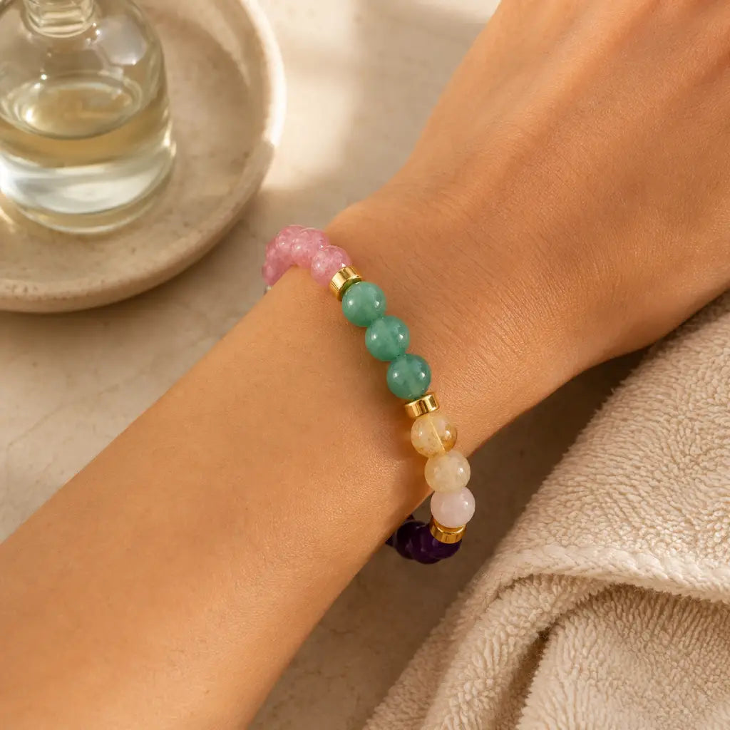 Manifestation bracelet with colorful crystal beads displayed for spiritual wellness and mindful energy flow.