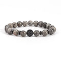 map jasper bracelet with gray stone beads and black tree charm, grounding gemstone jewelry for calm daily wear