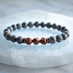 Map stone jasper bracelet with gray marbled beads and faceted red stones on white crystal for calming energy