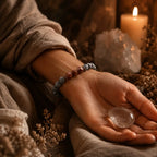 Map stone jasper bracelet shown with crystal, candle, and calming meditation setting for grounded energy work now