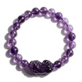 Natural amethyst bracelet featuring rich purple crystal beads and spiritual gemstone jewelry styling
