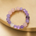 Natural Rose Quartz Amethyst Clear Quartz Crystal bracelet displayed on gold surface with premium gemstone styling.