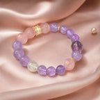 Natural Rose Quartz Amethyst Clear Quartz Crystal bracelet on silk fabric with feminine gemstone luxury design.