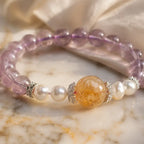 Natural ametrine citrine gemstone bracelet close-up featuring pearl details and handcrafted crystal elegance.