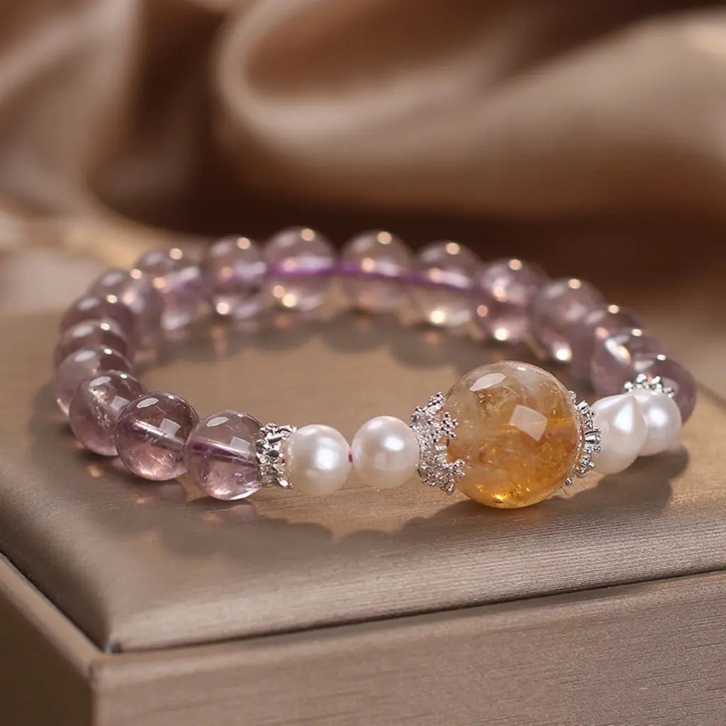 Natural ametrine citrine gemstone bracelet showcasing handcrafted pearl and healing crystal details.