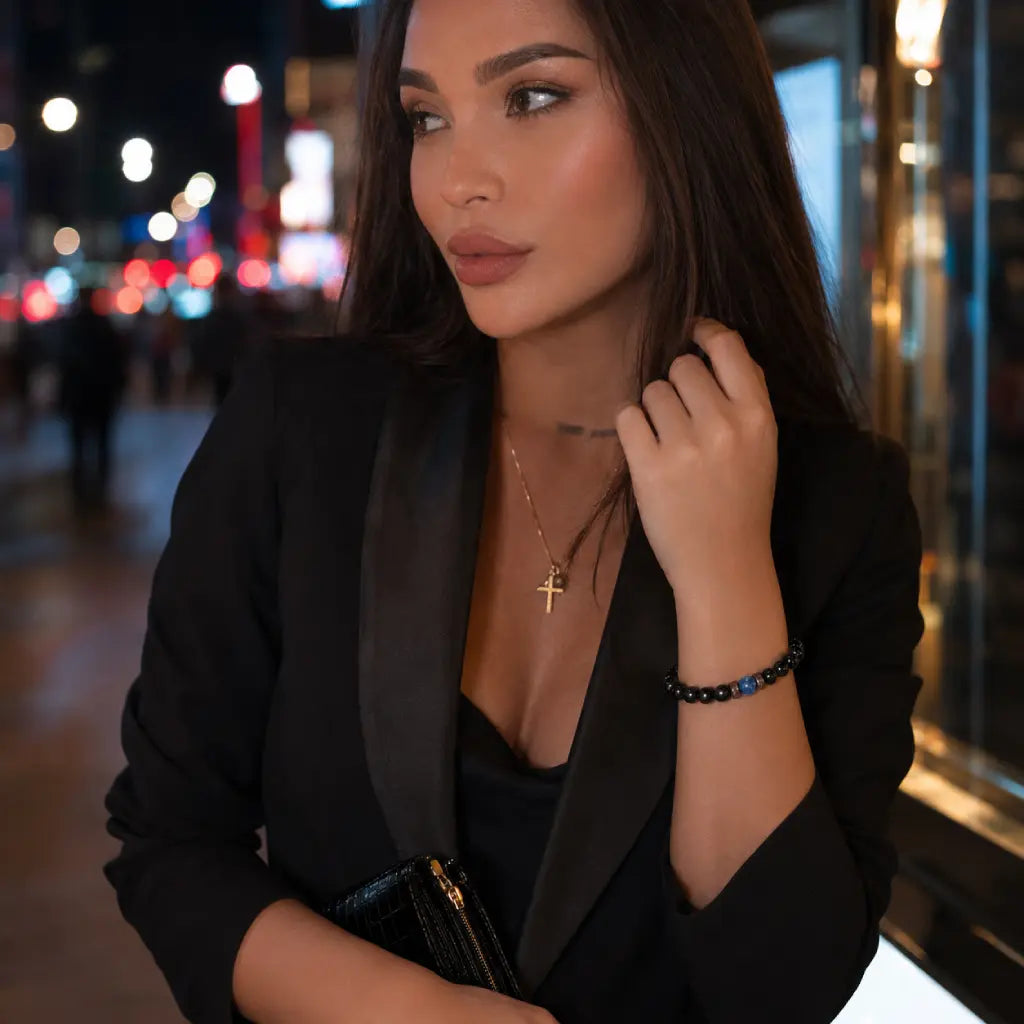 Obsidian lapis lazuli bracelet worn with a chic black outfit, featuring polished gemstone beads for elegant everyday luxury.