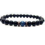 Obsidian lapis lazuli bracelet showcasing natural blue lapis lazuli, black obsidian gemstone beads, and handcrafted wood spacers for timeless style.