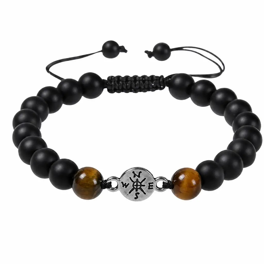 Onyx and Tiger eye bracelet with matte black beads and adjustable cord design for stylish everyday wear.