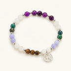 Pieces zodiac gemstone bracelet featuring amethyst, tiger eye and crystal beads with Pisces charm for astrology lovers