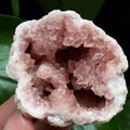Pink amethyst geode with large natural crystal points and shimmering druzy quartz, perfect for collectors and decorative displays.