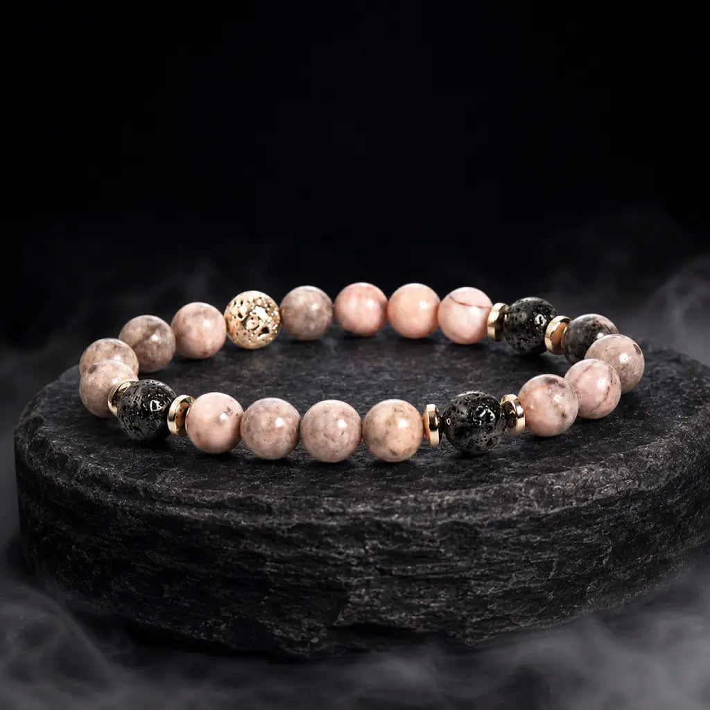 pink zebra jasper gemstone bracelet featuring lava beads and gold details for calming wellness appeal