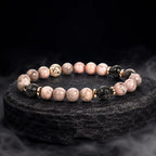 pink zebra jasper gemstone bracelet featuring lava beads and gold details for calming wellness appeal
