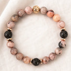 pink zebra jasper bracelet featuring natural lava stones and gold accents for stylish wellness comfort