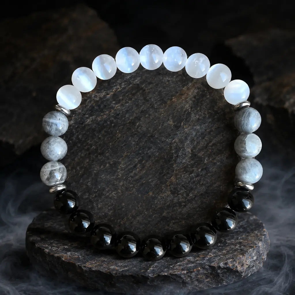 Protection bracelet with dark gemstones and healing crystals designed for grounding energy and inner focus