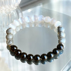 Protection bracelet with elegant healing stones and polished beads creating peaceful energy and daily comfort