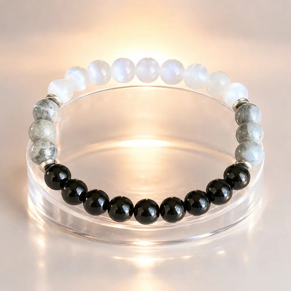 Protection bracelet with white and black healing stones for mindful energy support and elegant daily wear
