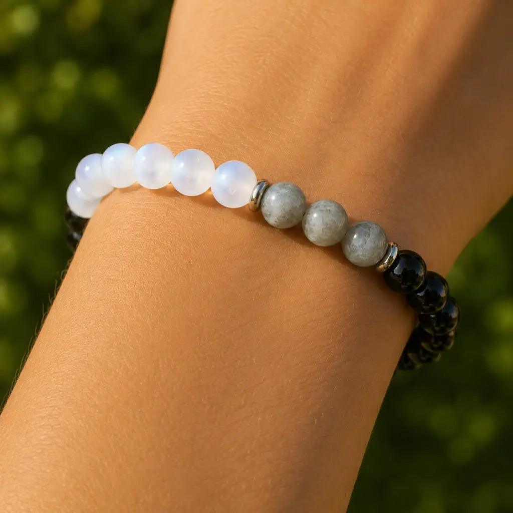 Protection bracelet worn on wrist with polished healing stones creating elegant energy and grounding support
