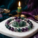 Rainbow Fluorite Crystal Bracelet beside candle and crystals, peaceful meditation setting enhancing focus clarity and spiritual harmony