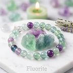 Rainbow Fluorite Crystal Bracelet with raw stones on marble, showcasing green purple clarity for healing balance and mindful energy
