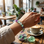 Rainbow Fluorite Crystal Bracelet in cozy cafe setting, soft tones enhance relaxation mindfulness and everyday stylish comfort wear