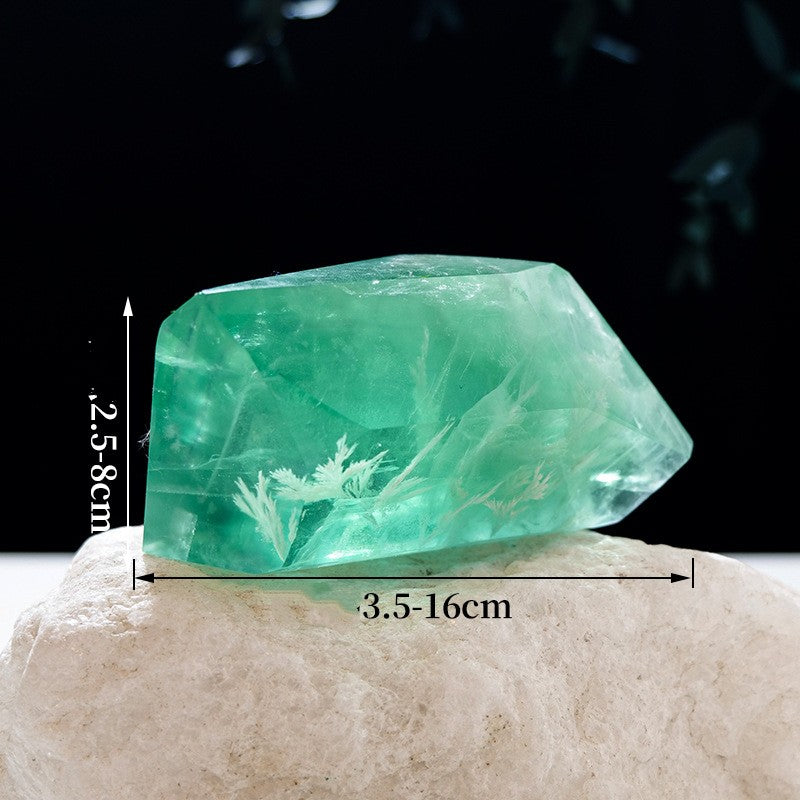 Raw fluorite crystal pictured as one natural stone with a random geometric form, highlighting its individual mineral character for crystal decor, collecting, or meditation display.