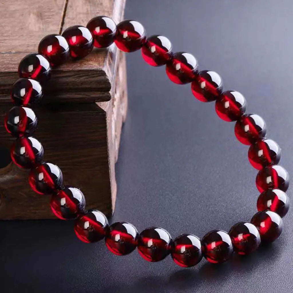 Red garnet jewelry beaded bracelet with deep ruby crystals, stylish gemstone accessory for modern everyday wear