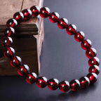 Red garnet jewelry beaded bracelet with deep ruby crystals, stylish gemstone accessory for modern everyday wear