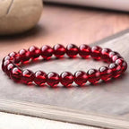Red garnet jewelry bead bracelet with rich crimson crystals, elegant fashion accessory for timeless gifting ideas