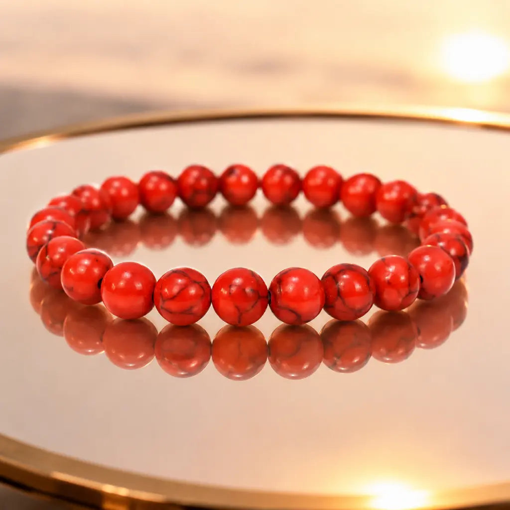 Red howlite bracelet with vibrant crystal gemstone beads displayed in soft natural lighting for style