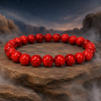 Red howlite bracelet with polished crystal beads in a mystical display for spiritual energy enhancement