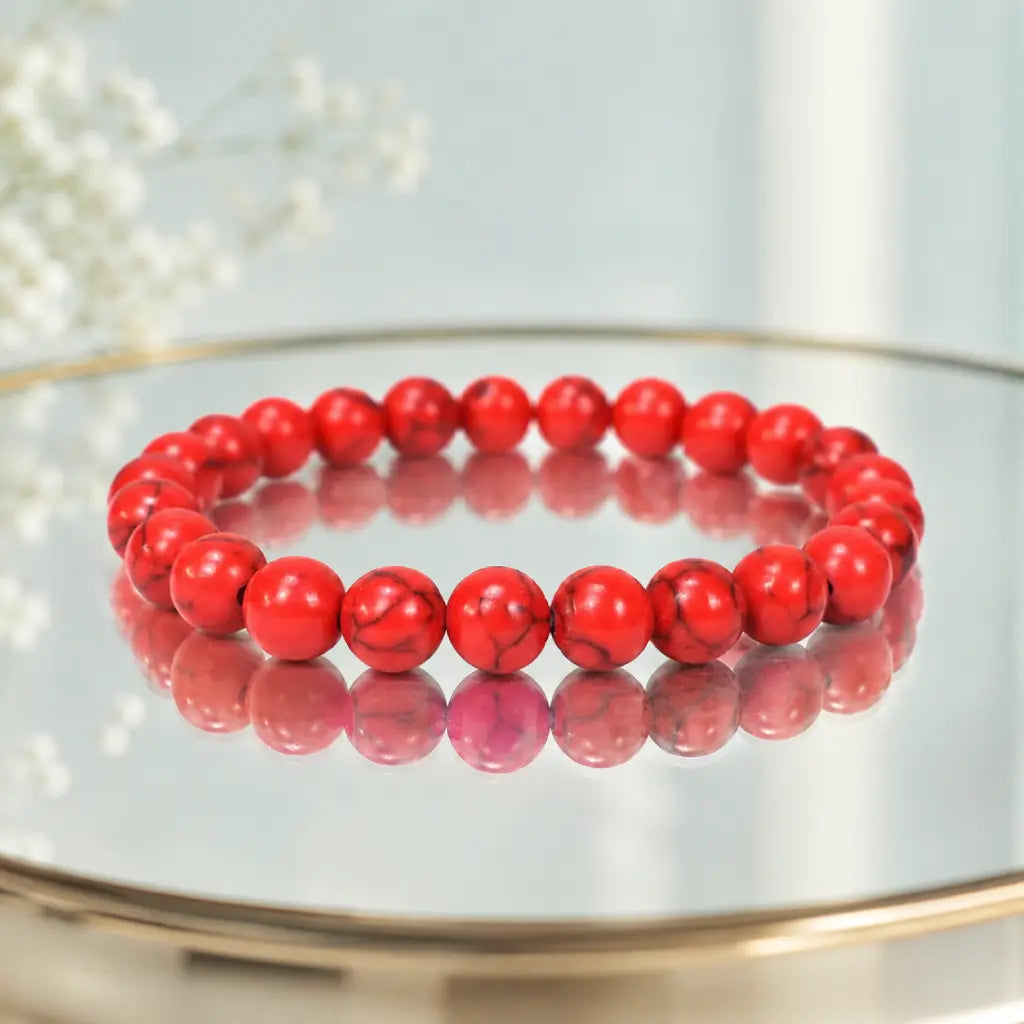 Red howlite bracelet featuring gemstone beads with clean reflective styling for elegant everyday wear