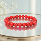 Red howlite bracelet featuring gemstone beads with clean reflective styling for elegant everyday wear