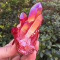 Red quartz crystal tower cluster featuring tall faceted points, vibrant raw gemstone specimen for collectors and elegant décor.