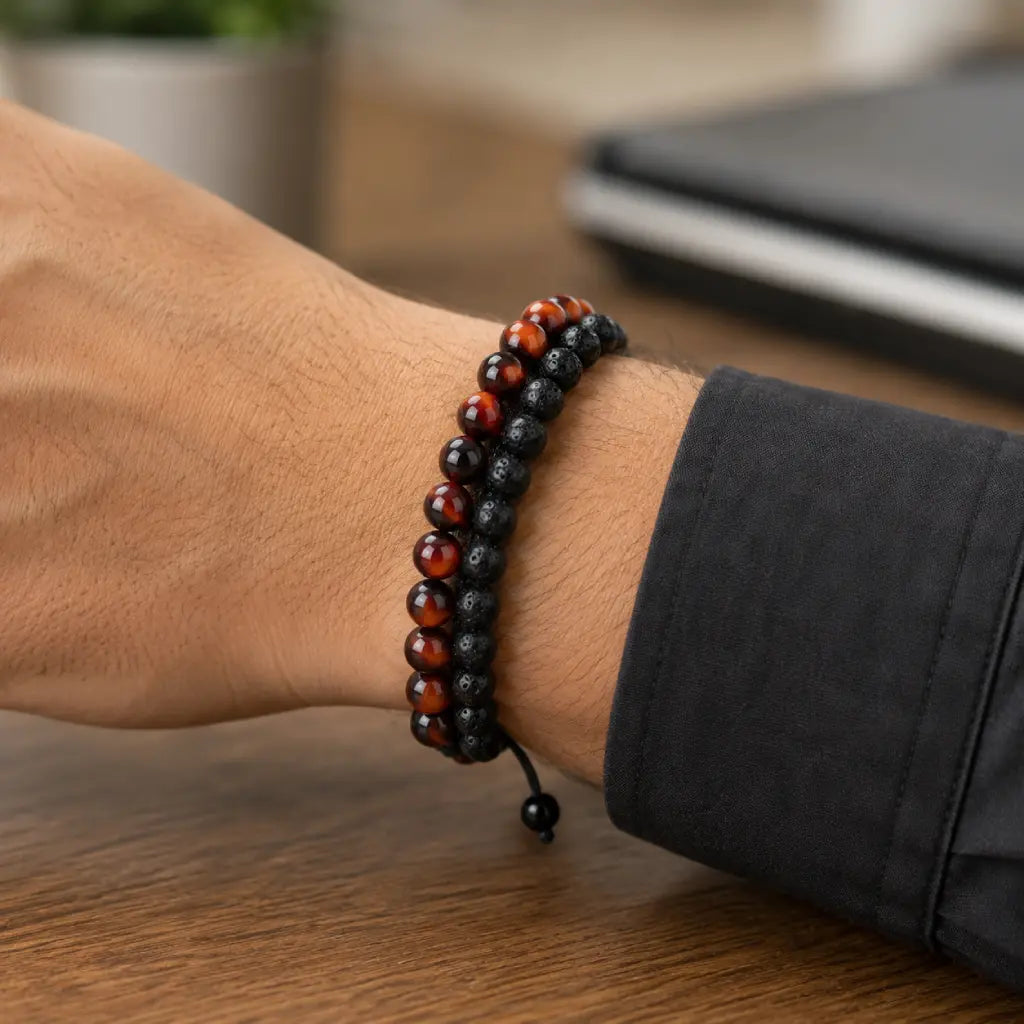 Red Tiger eye Bracelet with black lava stone beads worn on the wrist, offering a bold adjustable accessory for men.