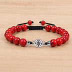 Red turquoise bracelet displayed on wood surface with polished stone beads for everyday fashion appeal