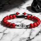 Red turquoise bracelet on dramatic marble setting with polished stone beads for premium fashion style