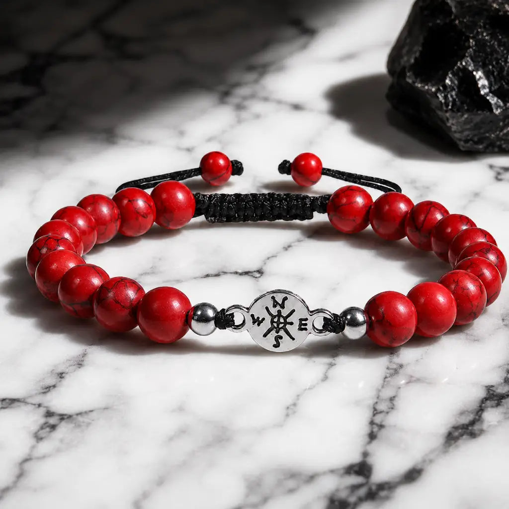 Red turquoise bracelet on dramatic marble setting with polished stone beads for premium fashion style