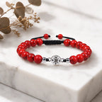 Red turquoise bracelet displayed with decorative accents for elegant gemstone jewelry presentation
