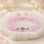 Rose Quartz gemstone bracelet styled with healing crystals and blush pink beads for soothing energy and balance