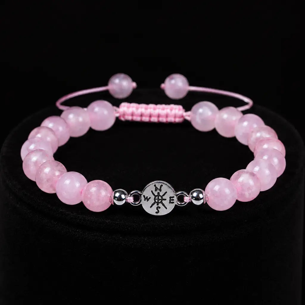Rose Quartz healing bracelet with polished pink crystal beads and silver charm for calming love energy daily