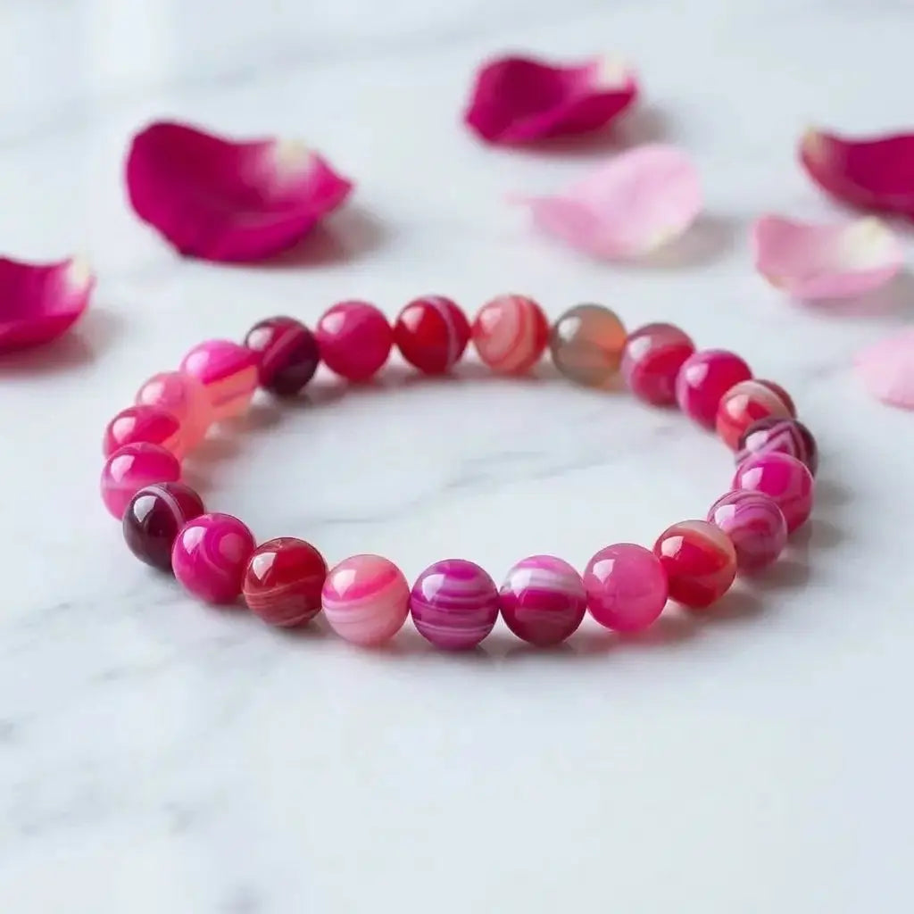 Rose stripe agate bracelet with rose petals on marble, polished pink gemstone beads for romantic healing gifts