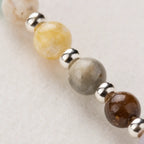 Sagittarius zodiac bracelet close-up showing natural gemstone beads, handcrafted astrology jewelry with premium details