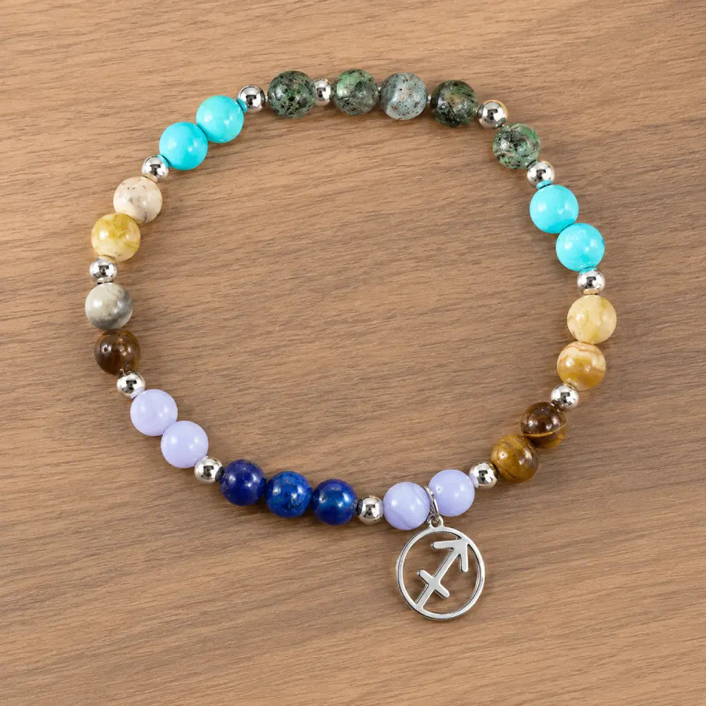 Sagittarius zodiac bracelet displayed on wood surface, handcrafted gemstone jewelry ideal for horoscope enthusiasts